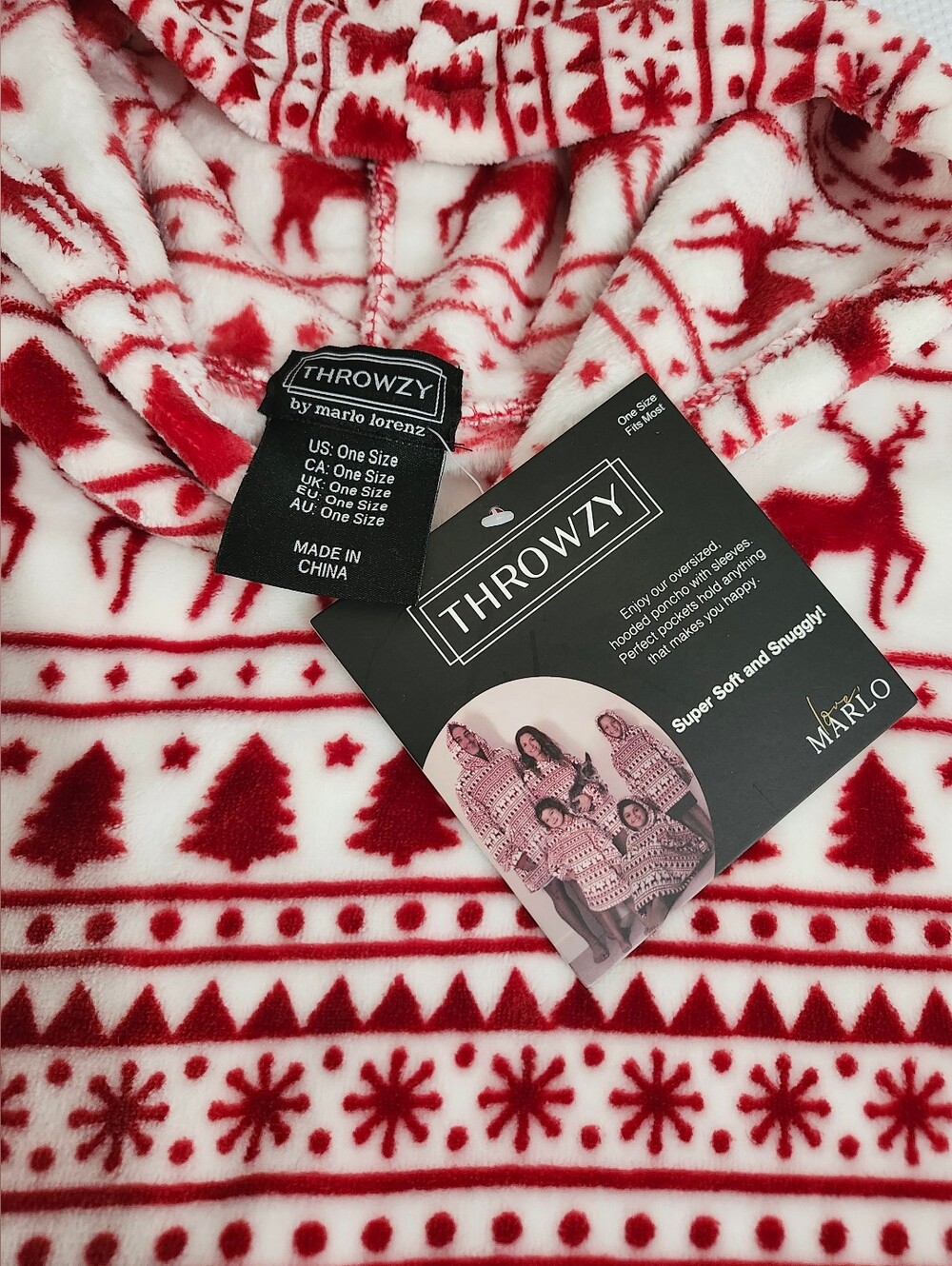 Throwzy wearable blanket hoodie features a red and white reindeer holiday patter - Picture 5 of 12